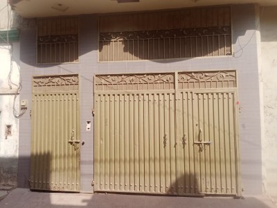 7 Marla Corner House Fully Marble with 3 Shops on SALE.