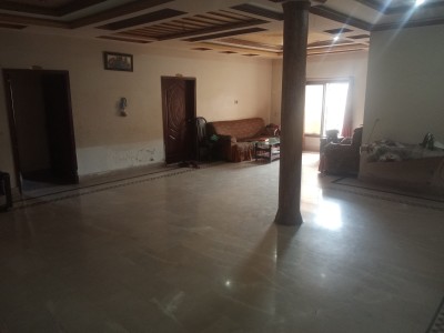 7 Marla Corner House Fully Marble with 3 Shops on SALE.